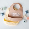 Pearhead® Peach Silicone Baby Bib Set